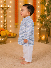 Side view of baby wearing blue floral full sleeve kurta with white pajama