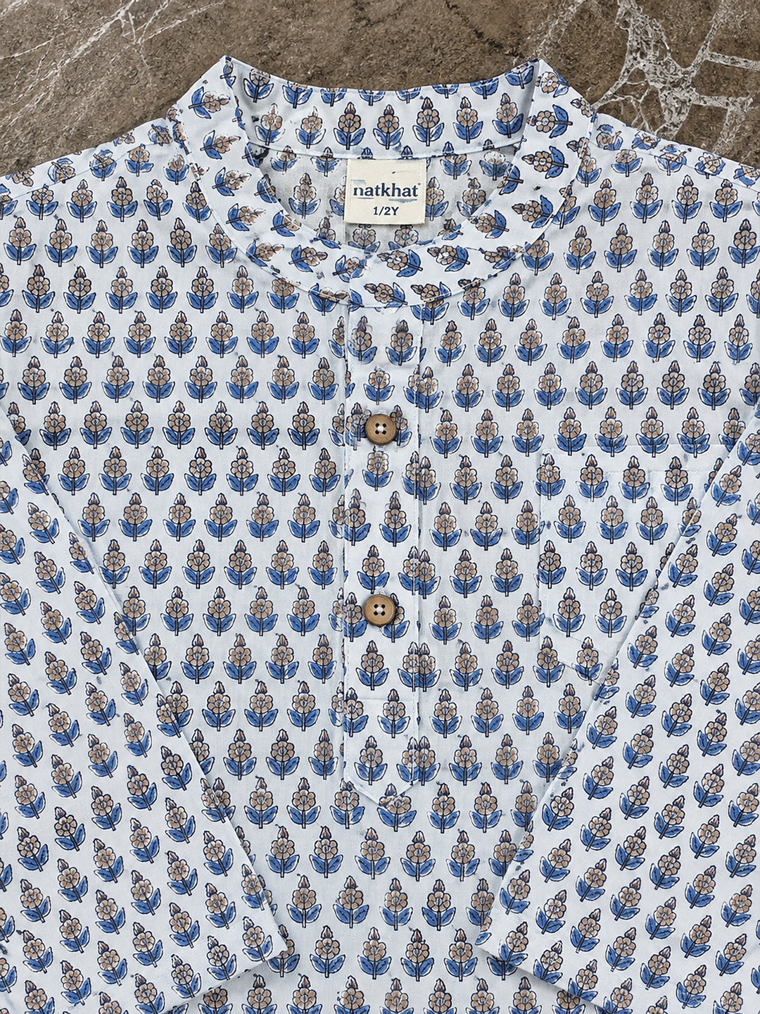 Blue floral printed baby kurta fabric and wooden button detail