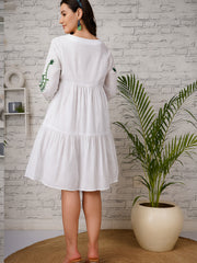 Back view of white maternity dress